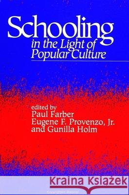 Schooling in the Light of Popular Culture Eugene F., Jr. Provenzo Gunilla Holm Paul Farber 9780791418727 State University of New York Press