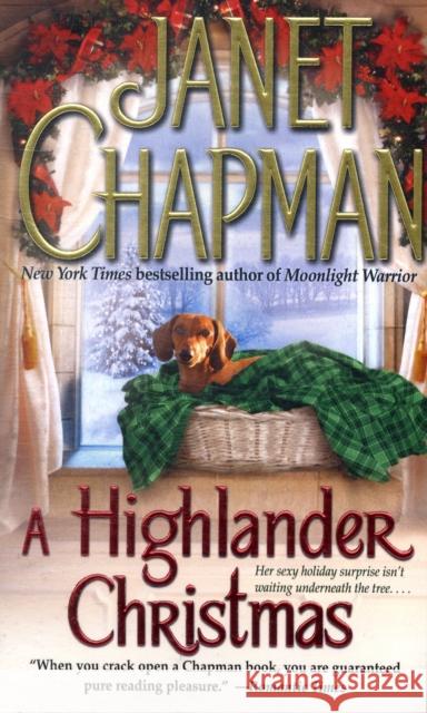 A Highlander Christmas : Her sexy holiday surprise isn't waiting underneath the tree . . . Janet Chapman 9781416595458 Pocket Star Books