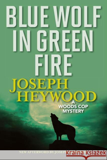 Blue Wolf in Green Fire: A Woods Cop Mystery Joseph Heywood 9781493040490 Lyons Press