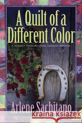 A Quilt of a Different Color Arlene Sachitano 9781612714295 Zumaya Enigma