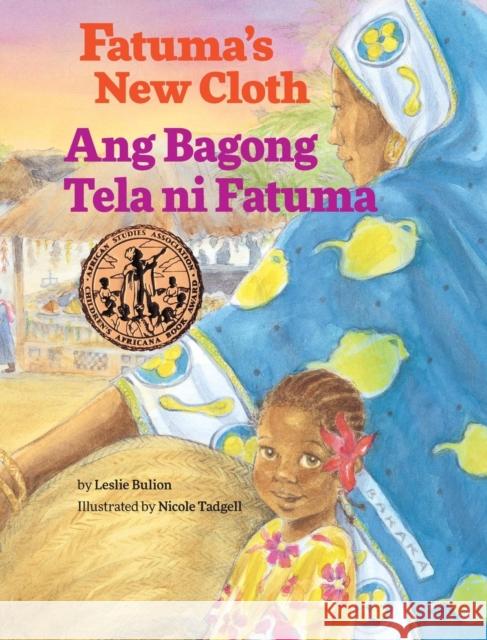 Fatuma's New Cloth / Ang Bagong Tela Ni Fatuma: Babl Children's Books in Tagalog and English Leslie Bulion Nicole Tadgell 9781683042471 Babl Books Inc.