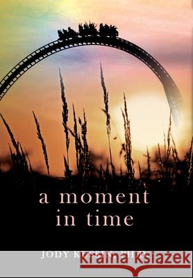 A Moment in Time: Finding Strength in a Pandemic Jody Kussin 9781737077787