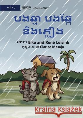 Cat and Dog and the Rain - បងឆ្មា បងឆ្កែ និងភ្លៀង Elke Leisink Rene Leisink Clarice Masajo 9781922835215 Library for All