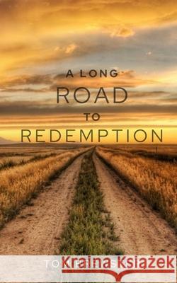 A Long Road to Redemption Tom Brewster 9781949472455 Beacon Publishing Group - książka