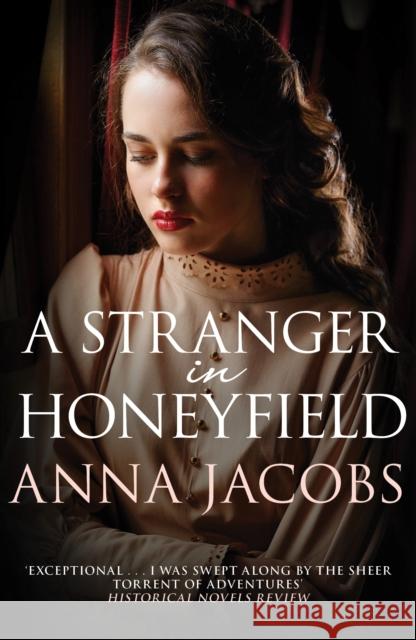 A Stranger in Honeyfield: From the multi-million copy bestselling author Anna (Author) Jacobs 9780749020255 Allison & Busby - książka