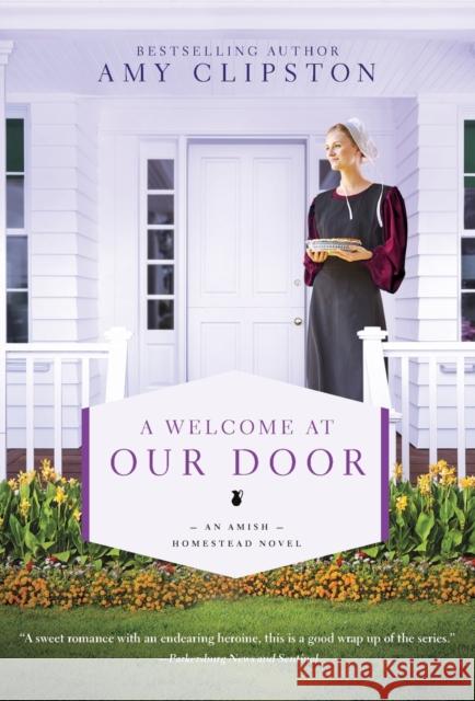 A Welcome at Our Door Amy Clipston 9780310363880 Zondervan - książka