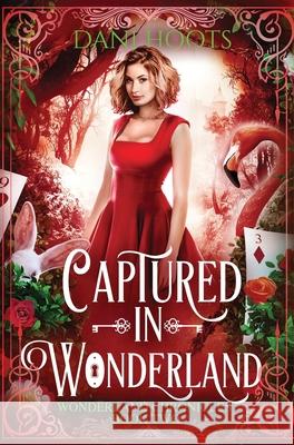 Captured in Wonderland Dani Hoots 9781942023784 Foxtales Press - książka