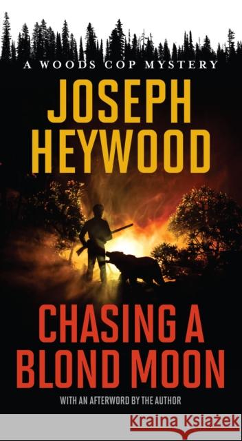 Chasing a Blond Moon: A Woods Cop Mystery Joseph Heywood 9781493059157 Rowman & Littlefield - książka