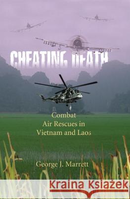 Cheating Death: Combat Air Rescues in Vietnam and Laos George J. Marrett Marrett 9781588342966 Smithsonian Books (DC) - książka