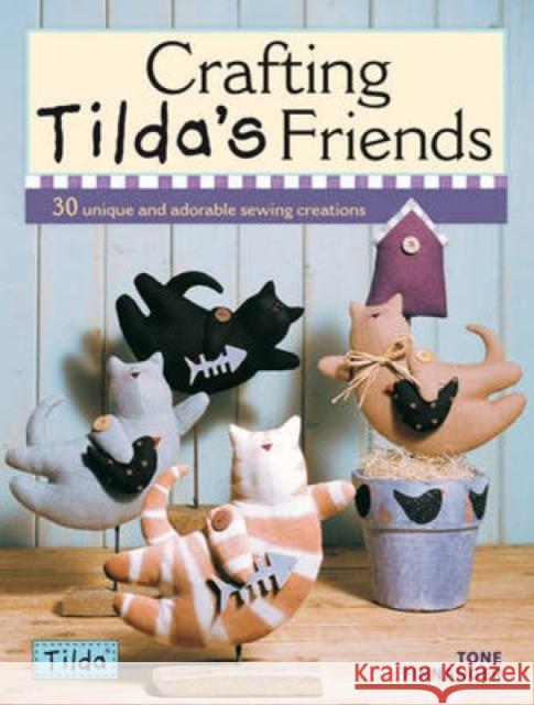 Crafting Tilda's Friends: 30 Unique Projects Featuring Adorable Creations from Tilda Tone (Author) Finnanger 9780715336663 David & Charles - książka