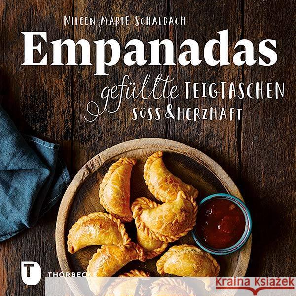 Empanadas : Gefüllte Teigtaschen süß & herzhaft Schaldach, Nileen Marie 9783799512725 Thorbecke - książka