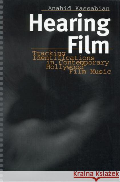 Hearing Film: Tracking Identifications in Contemporary Hollywood Film Music Kassabian, Anahid 9780415928540  - książka