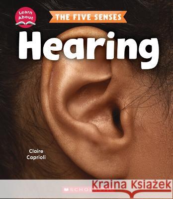 Hearing (Learn About) Claire Caprioli 9781338898279 Scholastic Press - książka