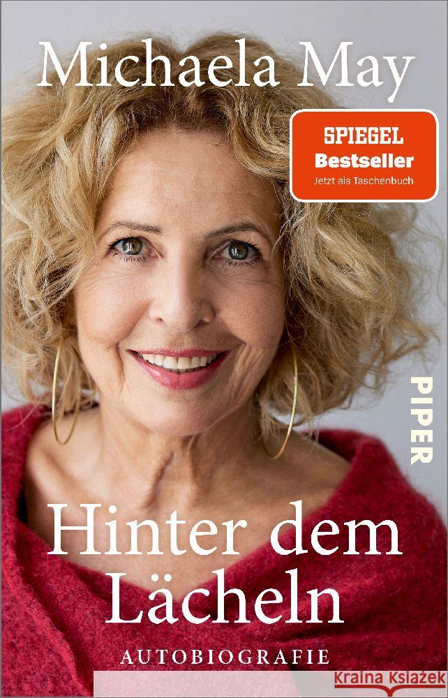 Hinter dem Lächeln May, Michaela 9783492320085 Piper - książka