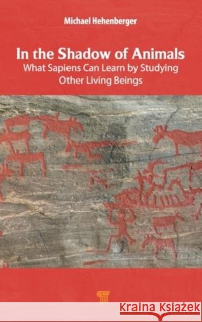 In the Shadow of Animals: What Sapiens Can Learn by Studying Other Living Things Michael Hehenberger 9789815129410 Jenny Stanford Publishing - książka