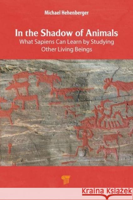 In the Shadow of Animals: What Sapiens Can Learn by Studying Other Living Things Michael Hehenberger 9789815129625 Jenny Stanford Publishing - książka