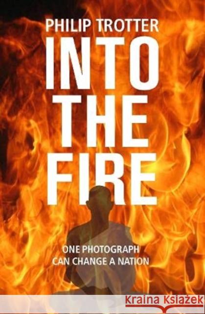 INTO THE FIRE: One Photograph Can Change A Nation Philip Trotter 9781910533567 Nine Elms Books - książka