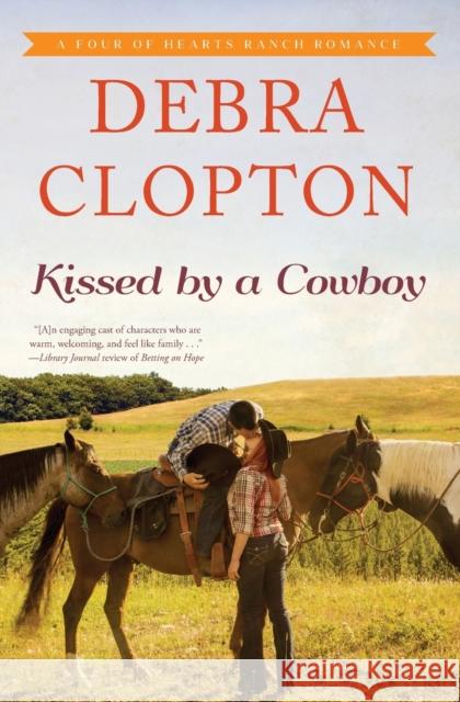 Kissed by a Cowboy Debra Clopton 9781401690533 Thomas Nelson - książka