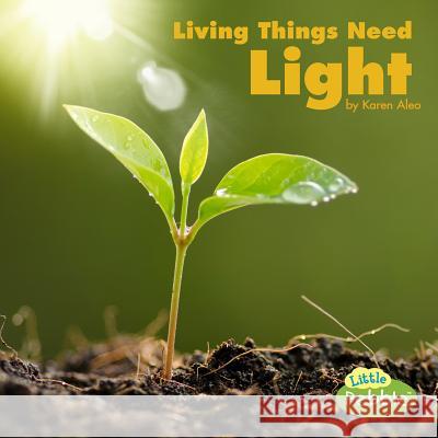 Living Things Need Light Karen Aleo 9781977110367 Pebble Books - książka