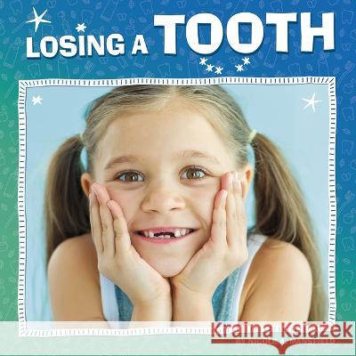 Losing a Tooth Nicole A. Mansfield 9780756570835 Pebble Books - książka