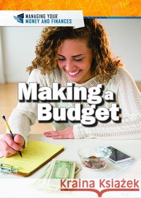 Making a Budget Xina M. Uhl Judy Monroe Peterson 9781508188551 Rosen Young Adult - książka