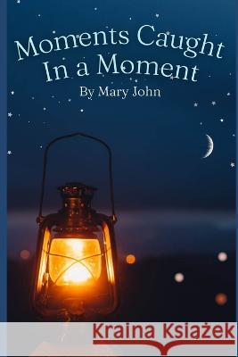 Moments Caught In a Moment Mary John   9798394881664 Independently Published - książka