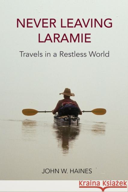 Never Leaving Laramie: Travels in a Restless World John W. Haines 9780870710315 Oregon State University Press - książka