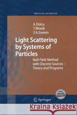 Light Scattering by Systems of Particles: Null-Field Method with Discrete Sources: Theory and Programs