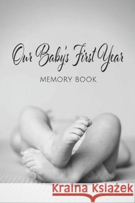 Our Baby's First Year Memory Book: Milestone Keepsake A. New Day Press 9781092477413 Independently Published - książka