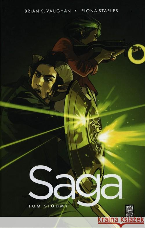 Saga T.7 Vaughan Brian K. 9788365938022 Mucha Comics - książka