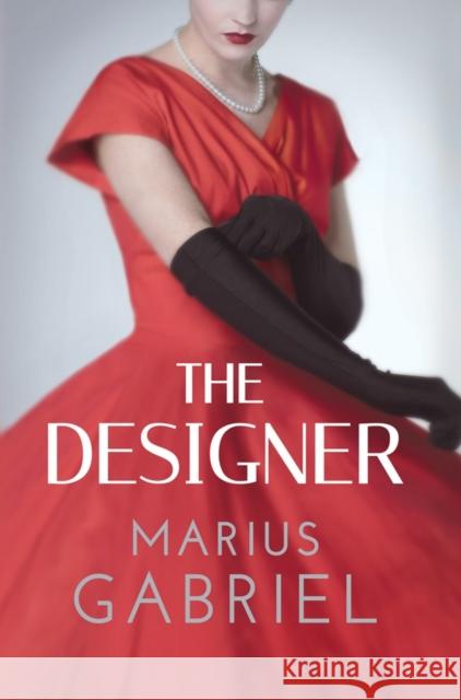 The Designer Marius Gabriel 9781612185811 Amazon Publishing - książka
