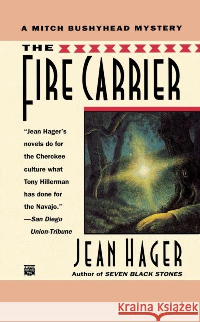 The Fire Carrier Jean Hager 9780446403870 Mysterious Press - książka