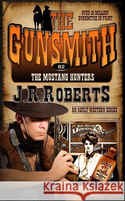 The Mustang Hunters J. R. Roberts 9781612326856 Speaking Volumes - książka