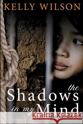 The shadows in my mind: Two bodies bound by one tormented past. Kelly Wilson 9780975642924 Wings for Grace Publications - książka