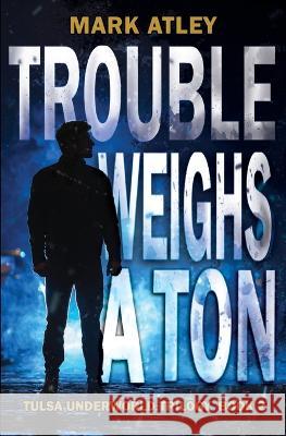 Trouble Weighs a Ton Mark Atley 9781644504734 4 Horsemen Publications - książka