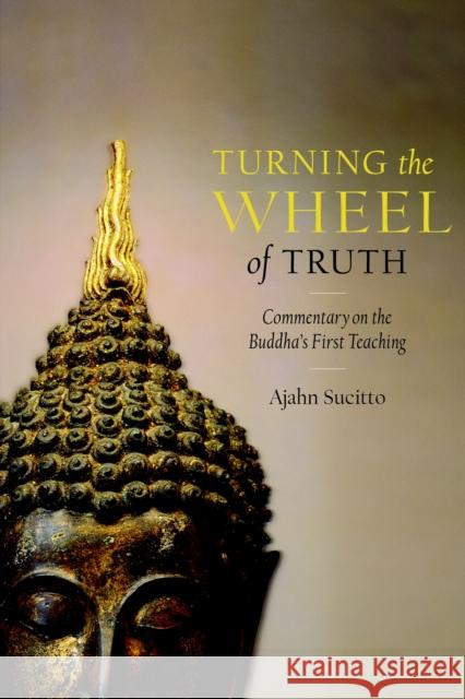 Turning the Wheel of Truth: Commentary on the Buddha's First Teaching Ajahn Sucitto 9781590307649 Shambhala Publications Inc - książka