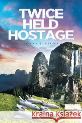 Twice Held Hostage Donna J Brown 9781642993240 Christian Faith - książka