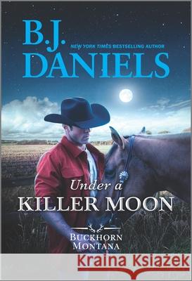 Under a Killer Moon Daniels, B. J. 9781335639899 Hqn - książka