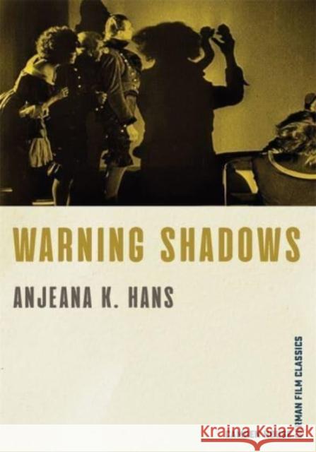 Warning Shadows Anjeana Hans 9781640140912 Camden House (NY) - książka