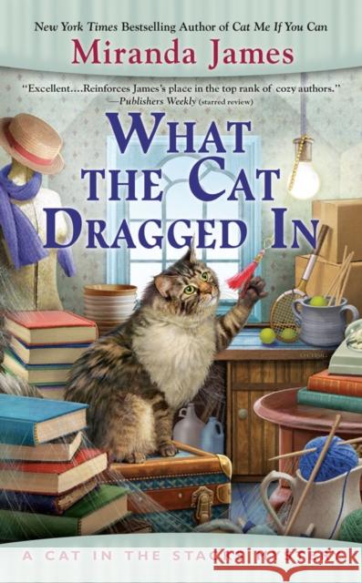 What the Cat Dragged in Miranda James 9780593199480 Penguin Putnam Inc - książka