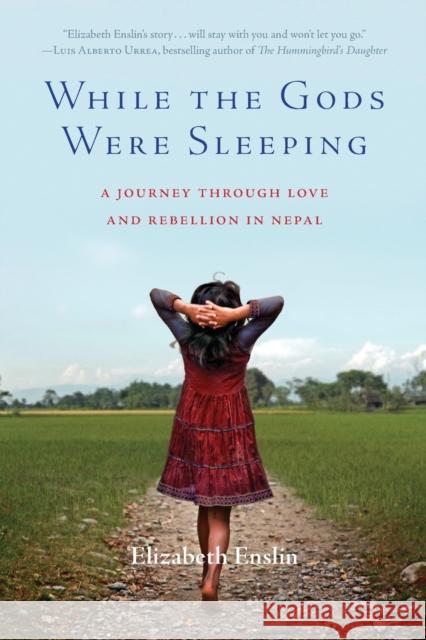 While the Gods Were Sleeping: A Journey Through Love and Rebellion in Nepal Elizabeth Enslin 9781580055444 Seal Press (CA) - książka