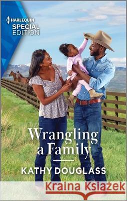 Wrangling a Family Kathy Douglass 9781335594464 Harlequin Special Edition - książka