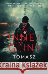 Z innej gliny Tomasz Duszyński 9788383299655 Skarpa Warszawska - książka